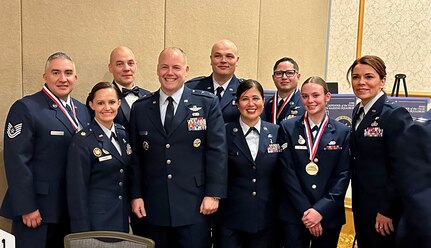 Alaska Missile Defenders of the year pose for a photo with their Air National Guard and Alaska Air National Guard leadership during the 2022 Missile Defense Advocacy Alliance Awards ceremony.  The Clear Space Force Station, Airmen and Guardians were honored amongst the MDAA awardees in Anchorage, Alaska, Nov. 5, 2022. The annual MDAA-sponsored event honors the best Air and Missile Defenders from Alaska’s Army National Guard, U.S. Air Force, U.S. Air Force Reserve Command, Alaska’s Air National Guard, and U.S. Space Force. (Courtesy Photo)