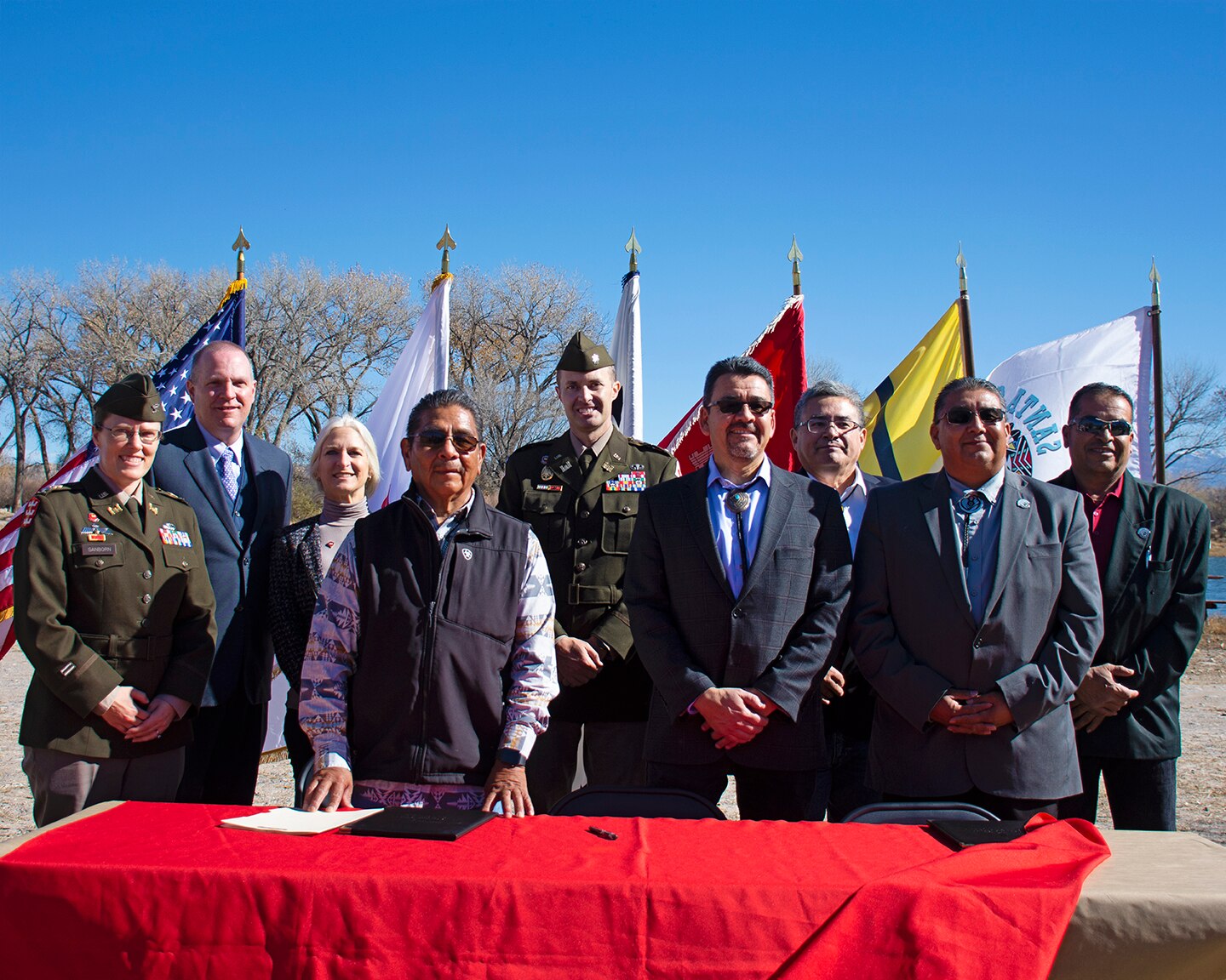 South Pacific Division Deputy Commander Col. Kathryn Sanborn; Albuquerque District Planning Chief Ryan Gronewold; Albuquerque District Deputy District Engineer Tori White; Governor J. Patrick Aguino of Ohkay Owingeh; Albuquerque District Commander Lt. Col. Jerre Hansbrough; Assistant Secretary of the Army for Civil Works Honorable Michael Connor; Principal Deputy Assistant Secretary of the Army for Civil Works Jamie Pinkham; Governor J. Michael Chavarria of Santa Clara Pueblo; and Lieutenant Governor James Naranjo of Santa Clara Pueblo pose for a photo at the end of the ceremony, Nov. 9, 2022.