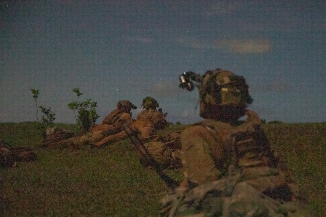 U.S. Army Soldiers from C Company 1-27 Wolfhounds, 25th Infantry Division, pull security in anticipation of an attack during the Joint Pacific Multinational Readiness Center (JPMRC) on Helemano Military Reservation, Hi., Nov. 2, 2022. JPMRC 23-1 trains the 2nd Infantry Brigade Combat Team “Warriors”, 25th Infantry Division in realistic conditions, ensuring they are prepared for crisis or conflict. (U.S. Army photo by Spc. Kelsey Kollar)