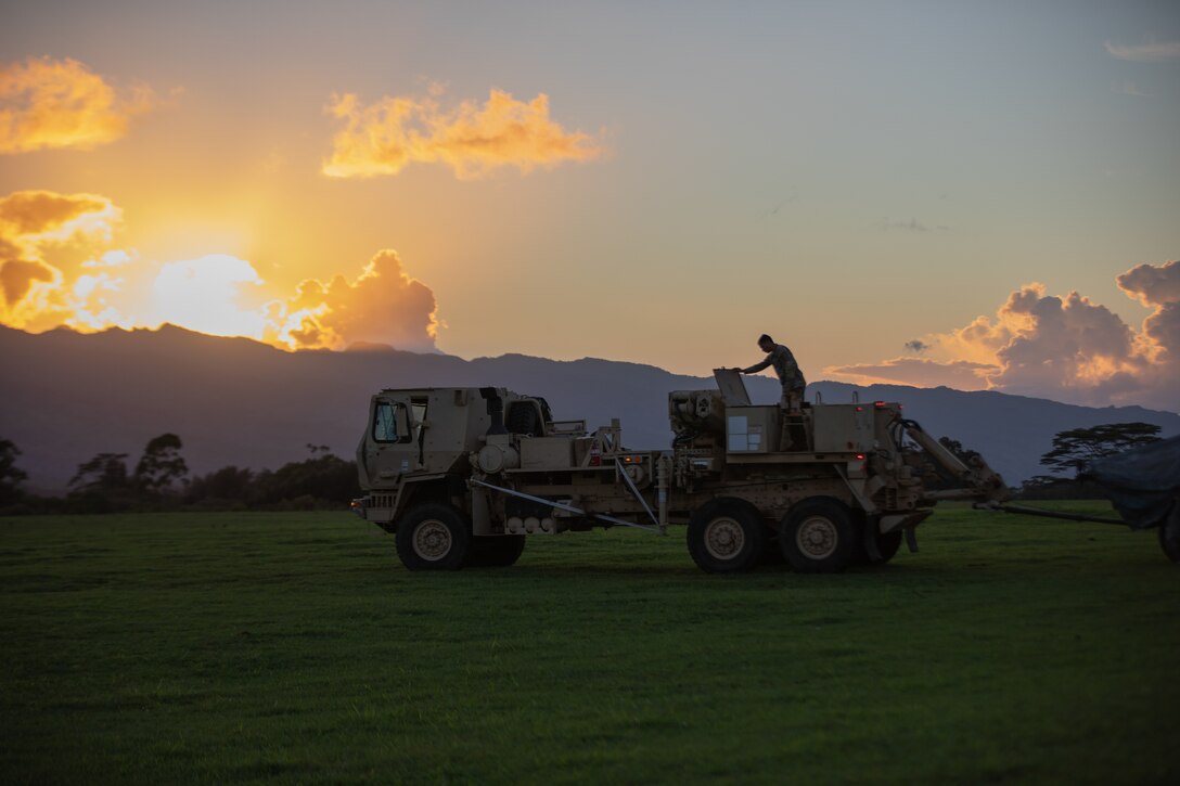 U.S. Army Soldiers from 58 Military Police Company, 25th Infantry Division, stand by for a mission during the Joint Pacific Multinational Readiness Center (JPMRC) on Helemano Military Reservation, Hi., Nov. 2, 2022. JPMRC 23-1 trains the 2nd Infantry Brigade Combat Team “Warriors”, 25th Infantry Division in realistic conditions, ensuring they are prepared for crisis or conflict. (U.S. Army photo by Spc. Kelsey Kollar)