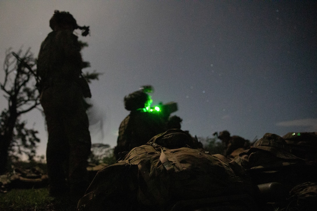 U.S. Army Soldiers from C Company 1-27 Wolfhounds, 25th Infantry Division, utilize a drone block during the Joint Pacific Multinational Readiness Center (JPMRC) on Helemano Military Reservation, Hi., Nov. 2, 2022. JPMRC 23-1 trains the 2nd Infantry Brigade Combat Team “Warriors”, 25th Infantry Division in realistic conditions, ensuring they are prepared for crisis or conflict. (U.S. Army photo by Spc. Kelsey Kollar)