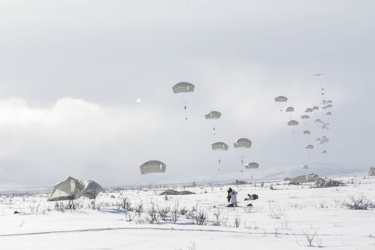 Paratroopers from the 1st Battalion, 501st Parachute Infantry Regiment, part of 4th Brigade, 25th Infantry Division assigned to United States Army Alaska, conduct a Joint Forcible Entry Operation onto Donnelly Drop Zone near Fort Greely, AK March 11, 2022 as part of Joint Pacific Multinational Readiness Center 22-02. JPMRC 22-02 is the first Home Station Combat Training Center (HS-CTC) rotation in Alaska. It focuses on Large Scale Combat Operations (LSCO) and is a Cold Weather training event that includes Situational Training Exercise (STX) and a Live Fire Exercise (LFX) in 2QFY22. This exercise will validate the 1/25th Stryker Brigade Combat Team’s Cold Weather training readiness and capabilities. (Staff Sgt. Christopher B. Dennis/USARAK Public Affairs NCO)