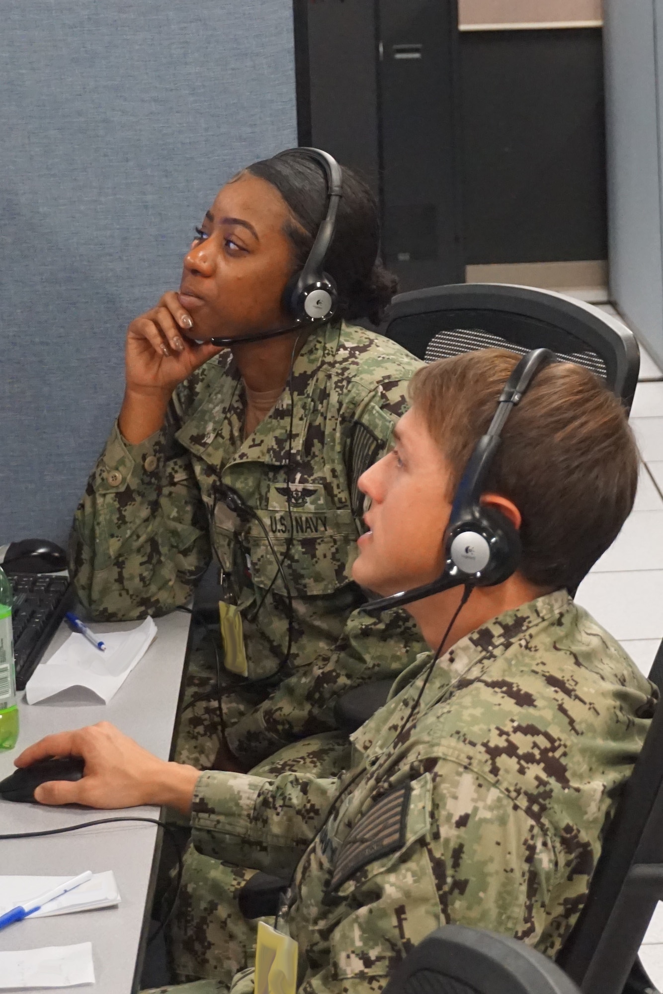 military members working at computers