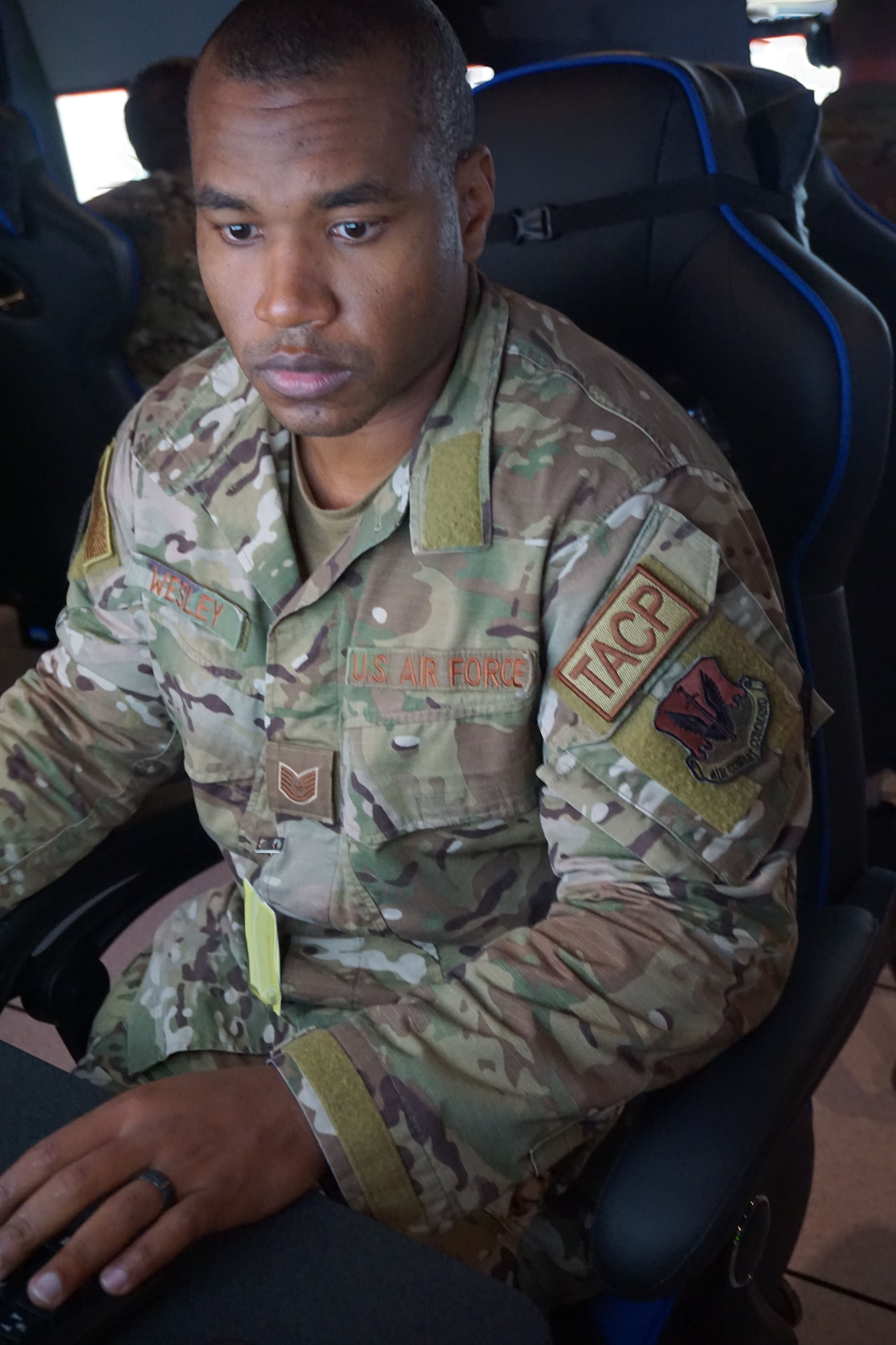 military member working at computer