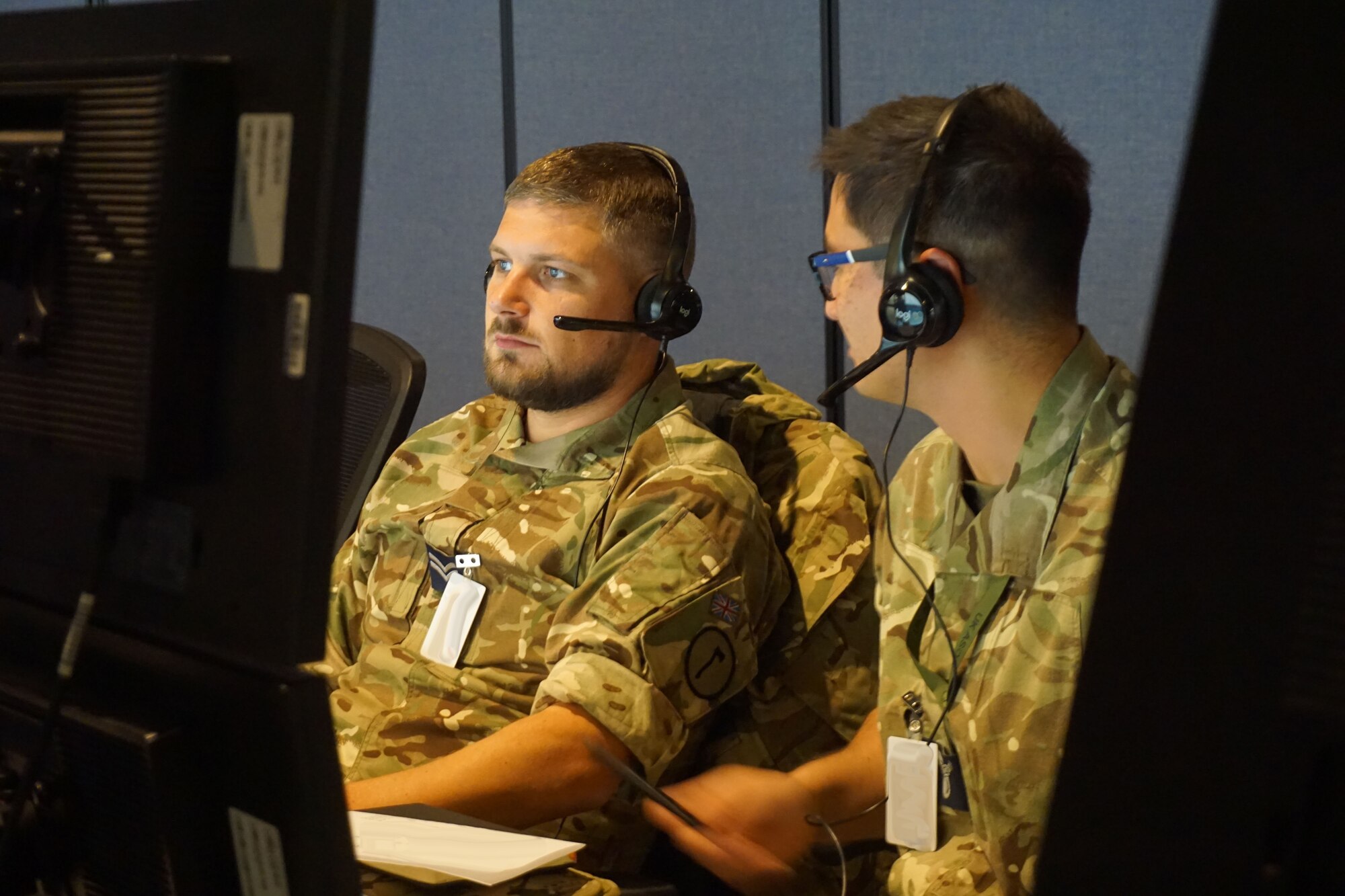 military members working at computers