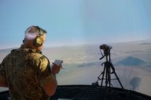military member taking notes in virtual environment