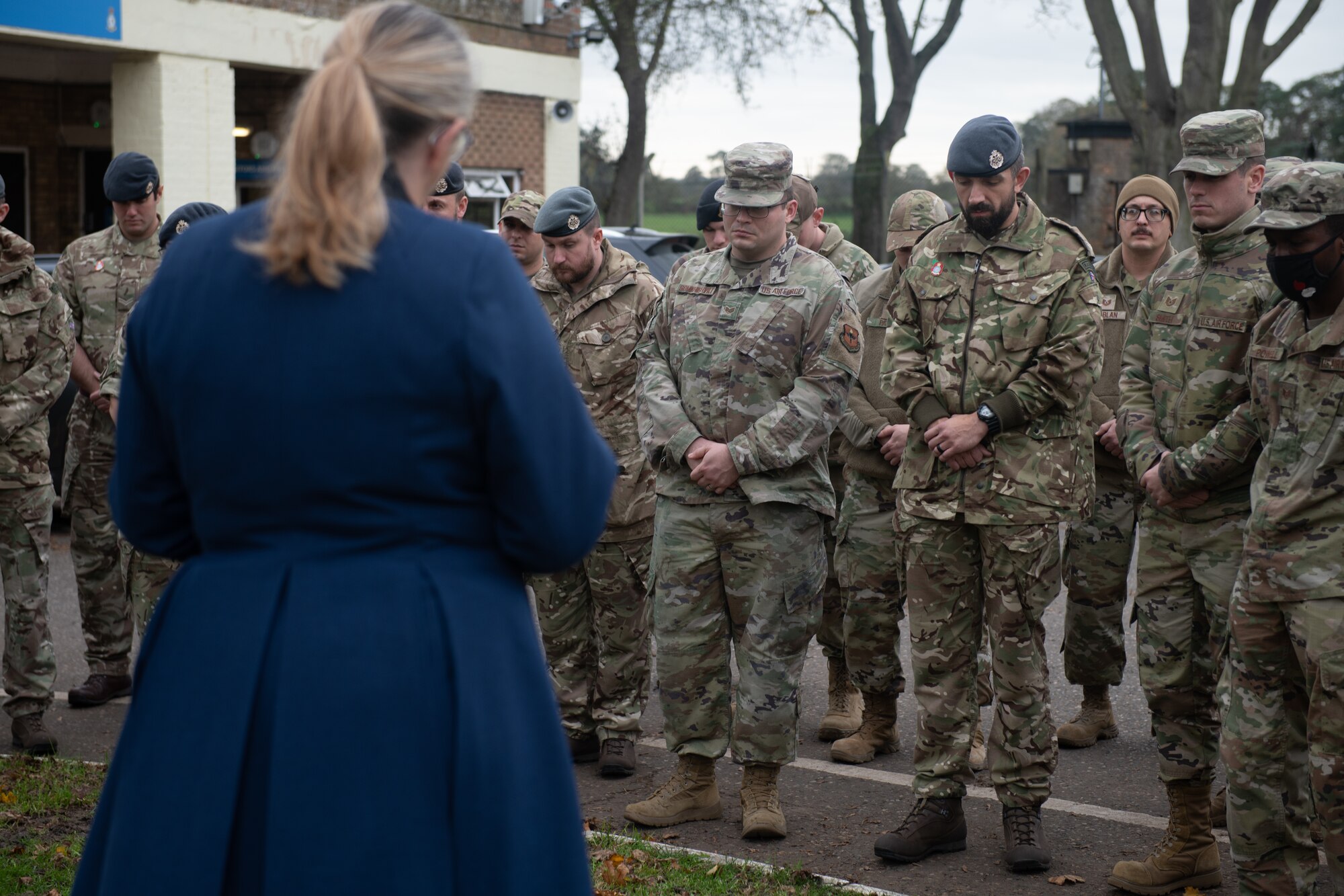 U.S. and Royal Air Force personnel participate in a memorial service Nov. 10, 2022, at RAF Honington, England. RAF Honington hosted U.S. Air Force noncommissioned officers for a leadership exchange program, strengthening ties between partner nations. (U.S. Air Force photo by Staff Sgt. Charles Welty)