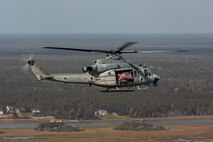 U.S. Marines with Marine Light Attack Helicopter Squadron (HMLA) 269 fly a UH-1Y Venom near Marine Corps Air Station New River, North Carolina, Nov. 7, 2022. This was the last flight for HMLA-269, which is deactivating in accordance with Force Design 2030. HMLA-269 is a subordinate unit of 2nd Marine Aircraft Wing, the aviation combat element of II Marine Expeditionary Force. (U.S. Marine Corps photo by Pfc. Rowdy Vanskike)