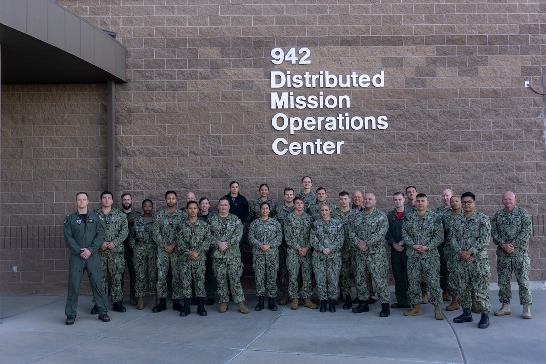 U.S. Navy forces participating in VIRTUAL FLAG: Coalition 23-1 at the 705th Combat Training Squadron, also known as the Distributed Mission Operations Center, at Kirtland Air Force Base, New Mexico, and distributed sites across four countries, Oct. 24 – Nov. 4, 2022. Exercise VFC serves as a train as you fight exercise by integrating the full spectrum of air, land, surface, space, and cyber warfighters in a virtual battlespace in joint and coalition environments; forces from the United States, United Kingdom, Australia, and Canada participated. (U.S. Air Force photo by Ms. Deb Henley)