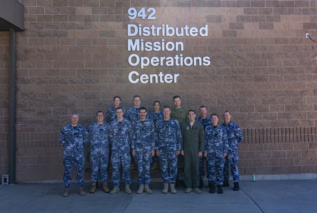 Royal Australian Air Force forces participating in VIRTUAL FLAG: Coalition 23-1 at the 705th Combat Training Squadron, also known as the Distributed Mission Operations Center, at Kirtland Air Force Base, New Mexico, and distributed sites across four countries, Oct. 24 – Nov. 4, 2022. Exercise VFC serves as a train as you fight exercise by integrating the full spectrum of air, land, surface, space, and cyber warfighters in a virtual battlespace in joint and coalition environments; forces from the United States, United Kingdom, Australia, and Canada participated. (U.S. Air Force photo by Ms. Deb Henley)