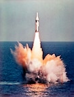 The first unarmed Polaris A1 Missile successfully launches from the fleet ballistic missile submarine USS George Washington (SSBN 598) off the coast of Cape Canaveral, Florida.