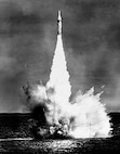 The first unarmed Polaris A1 Missile successfully launches from the fleet ballistic missile submarine USS George Washington (SSBN 598) off the coast of Cape Canaveral, Florida.