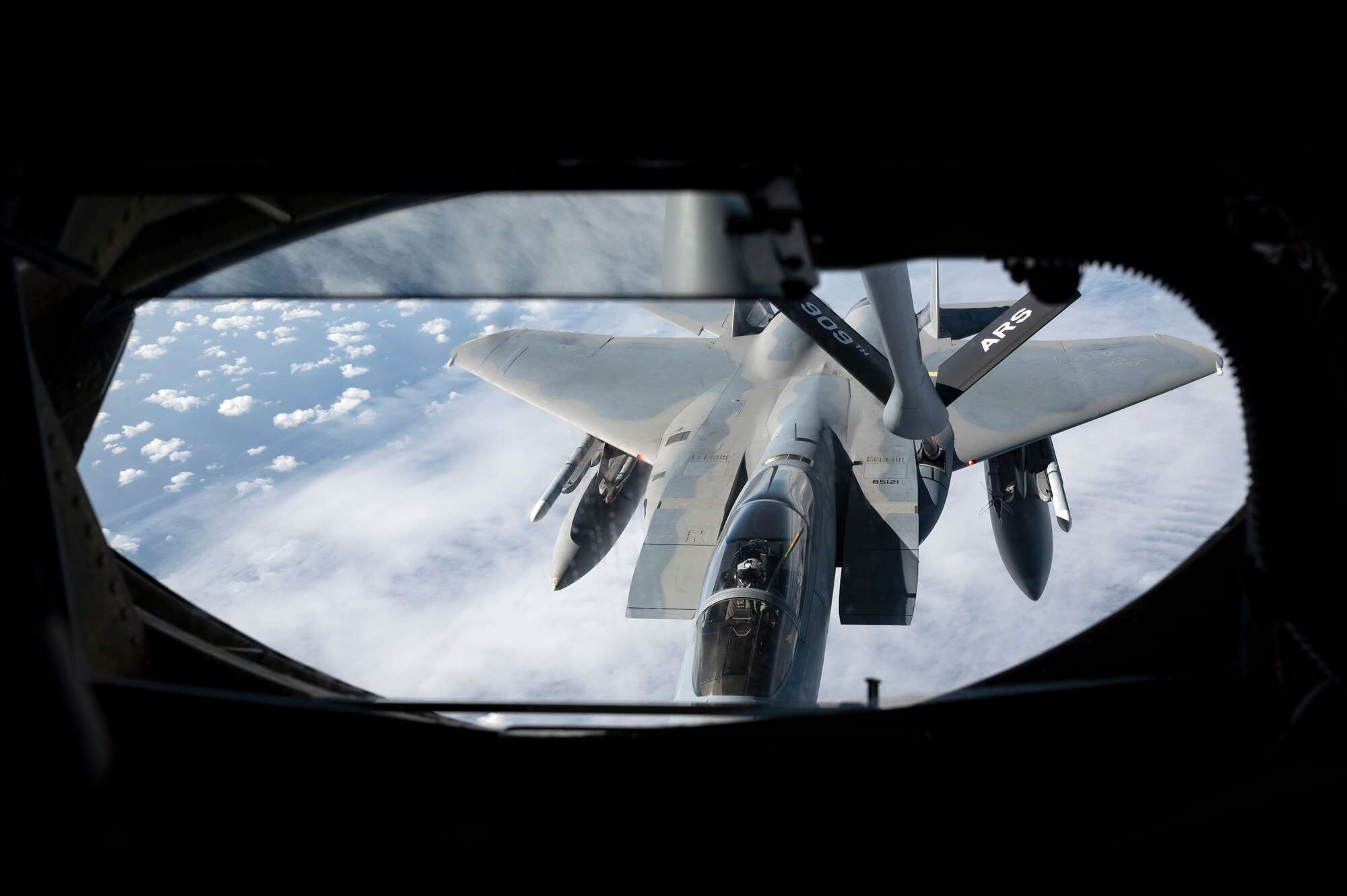A 44th Fighter Squadron F-15C Eagle receives fuel from a 909th Air Refueling Squadron KC-135 Stratotanker during a flight over the Pacific Ocean in support of exercise Keen Sword 23, Nov. 17, 2022. Bilateral exercises allow U.S. military and Japan Self-Defense Forces to work together across a variety of areas to enhance interoperability and readiness. (U.S. Air Force photo by Senior Airman Jessi Roth)