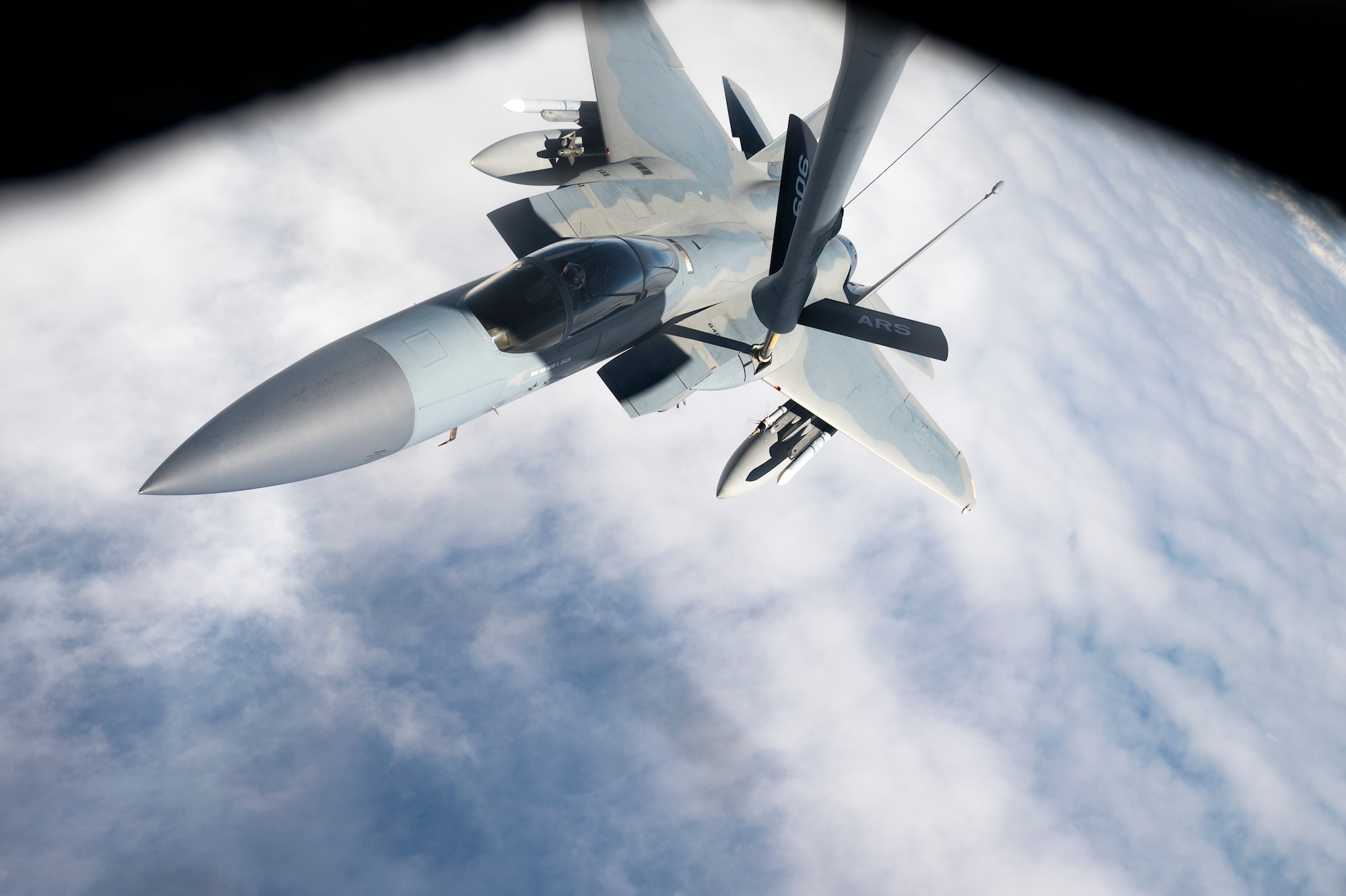 A 44th Fighter Squadron F-15C Eagle receives fuel from a 909th Air Refueling Squadron KC-135 Stratotanker during a flight over the Pacific Ocean in support of exercise Keen Sword 23, Nov. 17, 2022. Bilateral exercises demonstrate the U.S. and Japan’s strong, shared commitment to a free and open Indo-Pacific. (U.S. Air Force photo by Senior Airman Jessi Roth)
