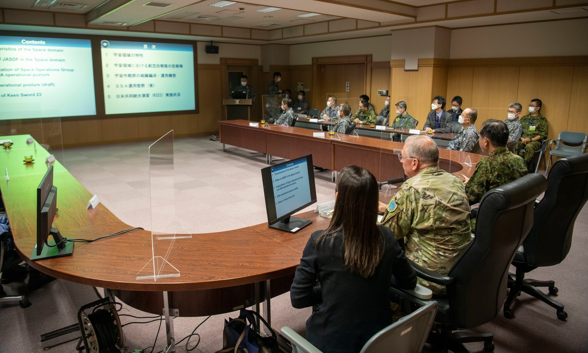U.S. Air Force Lt. Gen. Ricky Rupp, commander of United States Forces Japan and Fifth Air Force, and GEN Yamazaki Koji, chief of staff for the Japan Joint Staff, receive a Space Operations Center brief during exercise Keen Sword 23 at Fuchu Air Base, Japan, Nov. 17, 2022.
