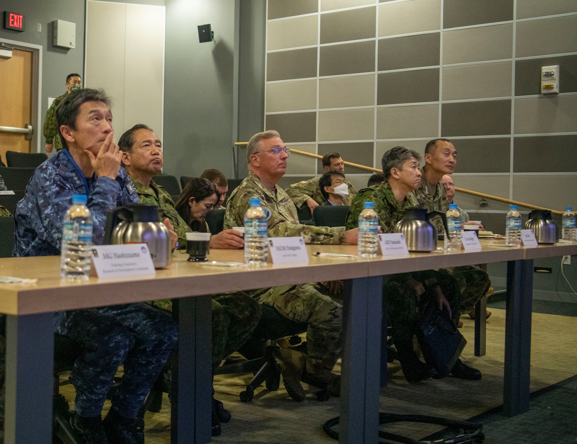 U.S. Air Force Lt. Gen. Ricky Rupp, commander of United States Forces Japan and Fifth Air Force, sits with Japan Air and Ground Self-Defense Force leaders for a multi-domain operations brief during exercise Keen Sword 23 at Sagami Depot, Japan, Nov. 17, 2022.