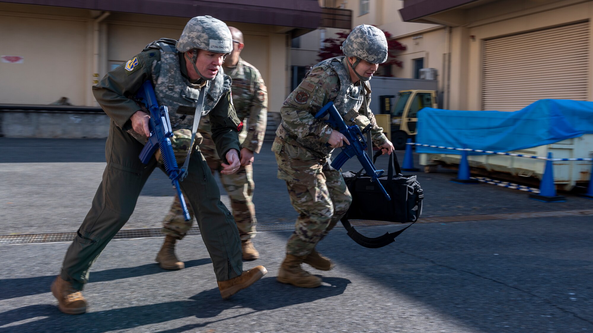 Three combat medics advance to cover