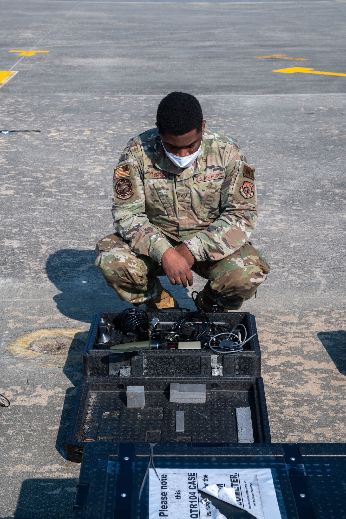 U.S. Air Force Staff Sgt. Jamal Hickmon, 51st Operational Support Squadron weather specialist, sets up a TMQ-53 tactical meteorological observing system during a combined training event involving USAF and Republic of Korea Air Force partners