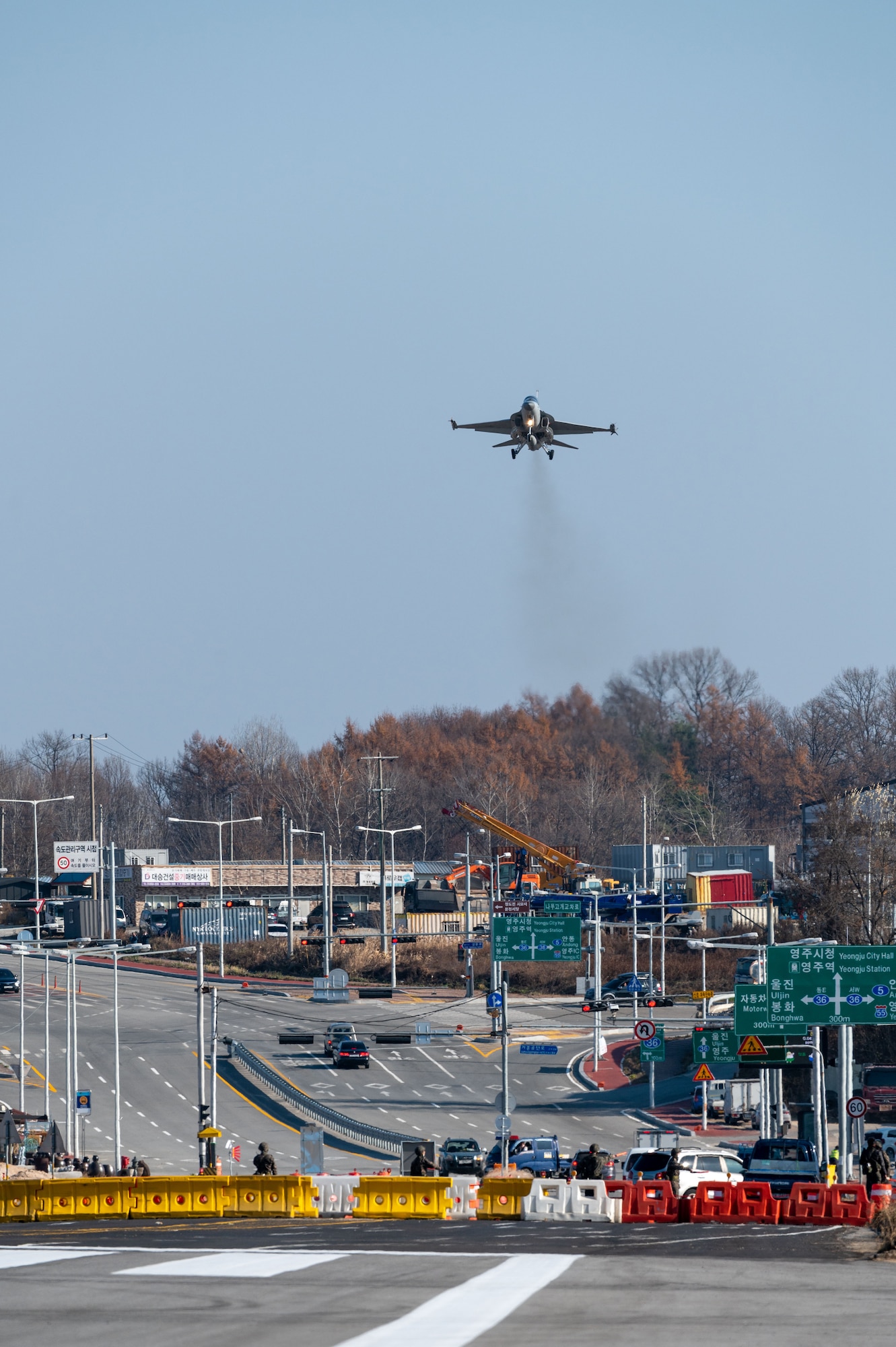 A Republic of Korea Air Force F-5 performs a low approach at an emergency landing strip as part of a combined training event involving U.S. Air Force and ROKAF partners