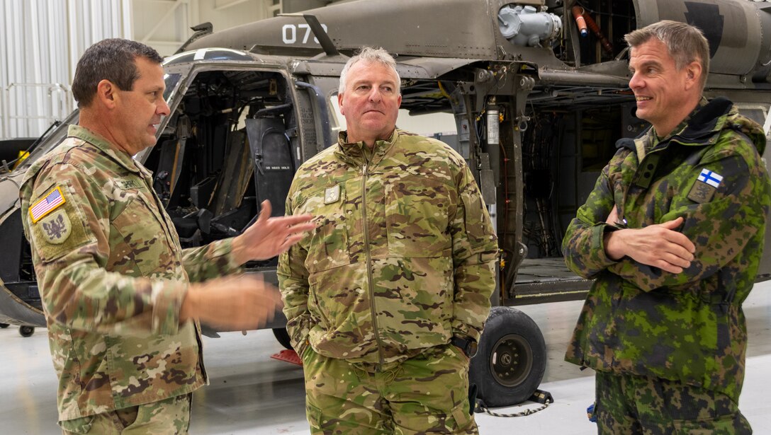 FORT INDIANTOWN GAP, Pa. – First Sgt. Steven Shirk, with the Eastern Army National Guard Aviation Training Site discusses aviation maintenance with Brig. Gen. Michael Shapland, an attaché from New Zealand, and Lt. Col. Markus Mecklin, an attaché from Finland, during a tour of the Aviation Maintenance Instructional Building here Nov. 16 as part of the Defense Intelligence Agency’s Fall 2022 Operations Orientation Program tour of Pennsylvania National Guard facilities here.