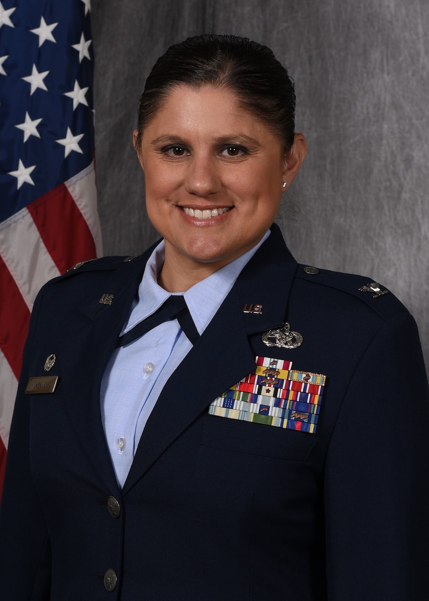 Col. Kathleen M. LaBahn, 911th Mission Support Group commander, poses for an official portrait in front of a gray background