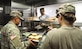 U.S. Army Sgt. James Munar, a Pomona, California native and a culinary specialist with the 605th Transportation Detachment, 8th Special Troops Battalion, 8th Theater Sustainment Command, helps prepare lunch with his Soldiers on board the Logistic Support Vessel the CW3 Harold A. Clinger (LSV-2), 40-miles south of Joint Base Pearl Harbor-Hickam, Hawaii on Oct. 4, 2017.