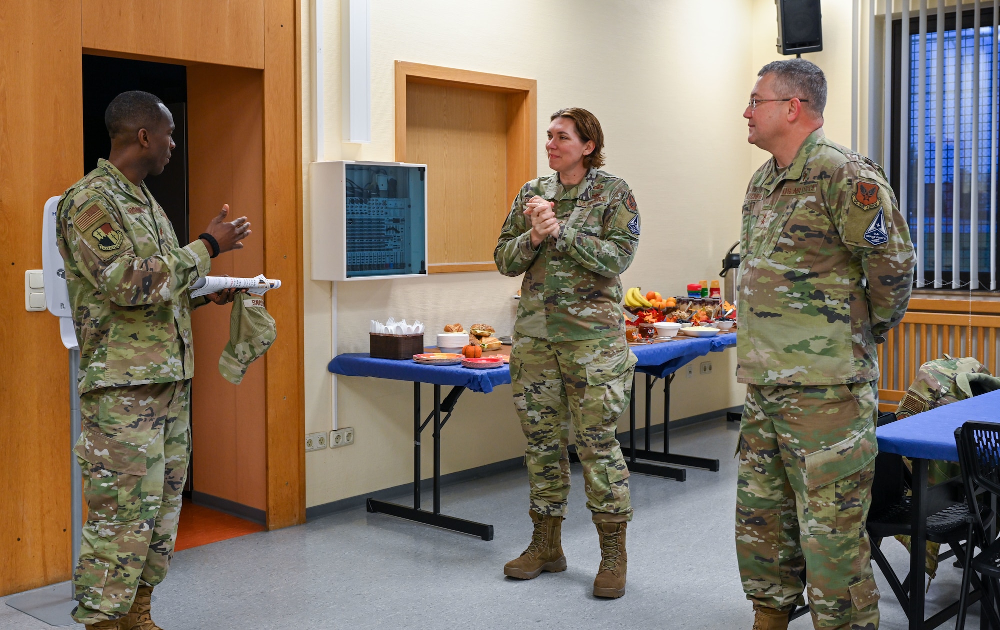 (Far left) Chaplain (Maj.) Anthony Wiggins, 52nd Fighter Wing, welcomes Chief Master Sgt. Sadie Chambers, Religious Affairs senior enlisted advisor, and Chaplain (Maj. Gen.) Randall Kitchens, U.S. Air Force chief of chaplains, at Spangdahlem Air Base, Germany, Nov. 16, 2022. The U.S. Air Force Chief of Chaplains organizes, trains and equips the Chaplain Corps to inspire readiness in others. (U.S. Air Force photo by Senior Airman Jessica Sanchez-Chen)