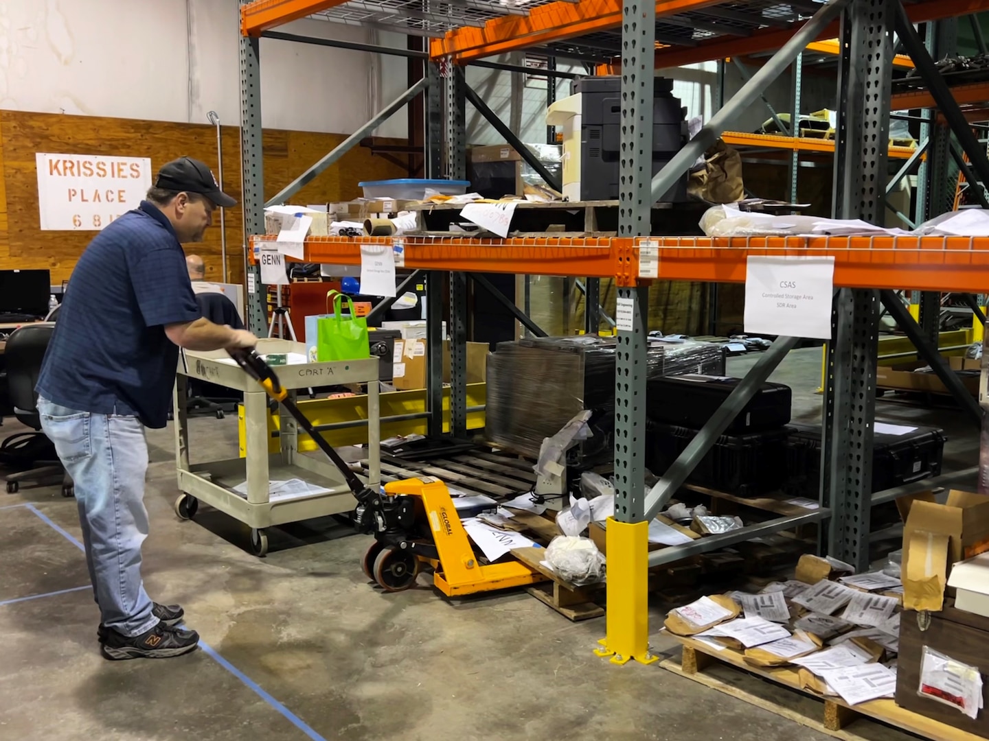 man working on warehouse pallet