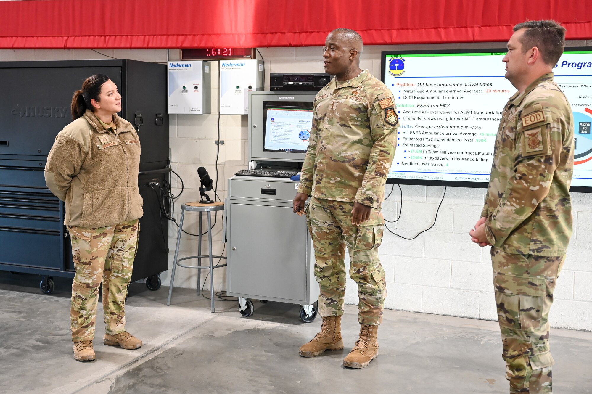 Senior Master Sgt. Vanessa Espinoza (left), 775th Fire & Emergency Services deputy fire chief, addressed Lt. Gen. Stacey Hawkins (center), Air Force Sustainment Center commander, and Lt. Col. Daniel Long, 775th Civil Engineering Squadron commander, during a base visit at the fire station Nov. 14, 2022, at Hill Air Force Base, Utah. (U.S. Air Force photo by Cynthia Griggs)