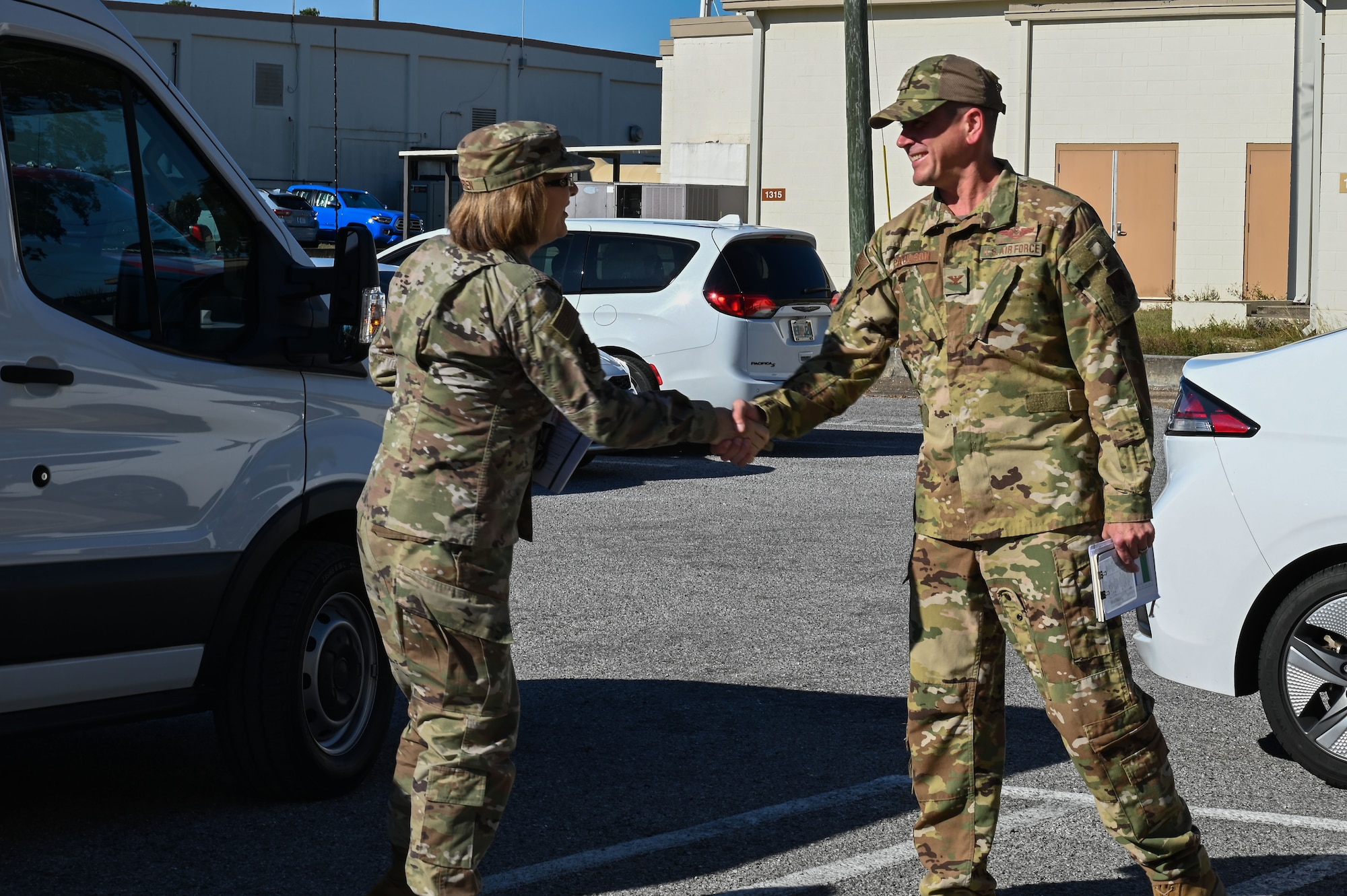 U.S. Colonel Eric Paulson, 350th Spectrum Warfare Wing (SWW) vice commander, greets U.S. Air Force Lt. Gen. Mary O’Brien, Deputy Chief of Staff for Intelligence, Surveillance, Reconnaissance and Cyber Effects Operations, during her visit at Eglin Air Force Base, Fla., Nov. 18, 2022. The 350th SWW serves as the Air Force’s first Electromagnetic Spectrum (EMS) focused wing focused on enhancing air component commanders’ ability to synchronize, integrate and execute EMS capabilities across all domains and platforms. (U.S. Air Force photo by Staff Sgt. Ericka A. Woolever)