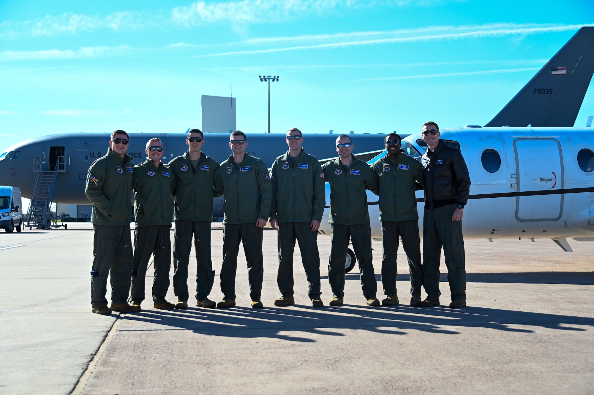 First assignment instructor pilots (FAIP) from Columbus Air Force Base (AFB), Mississippi, pose for a group photo at Altus AFB, Oklahoma, Nov. 15, 2022. FAIPs are selected to remain at their undergraduate pilot training base to instruct incoming students. (U.S. Air Force photo by Senior Airman Kayla Christenson)