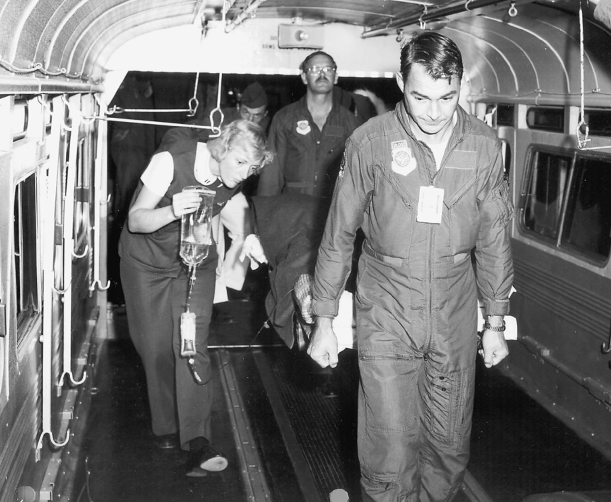 Image of Airmen loading a patient.