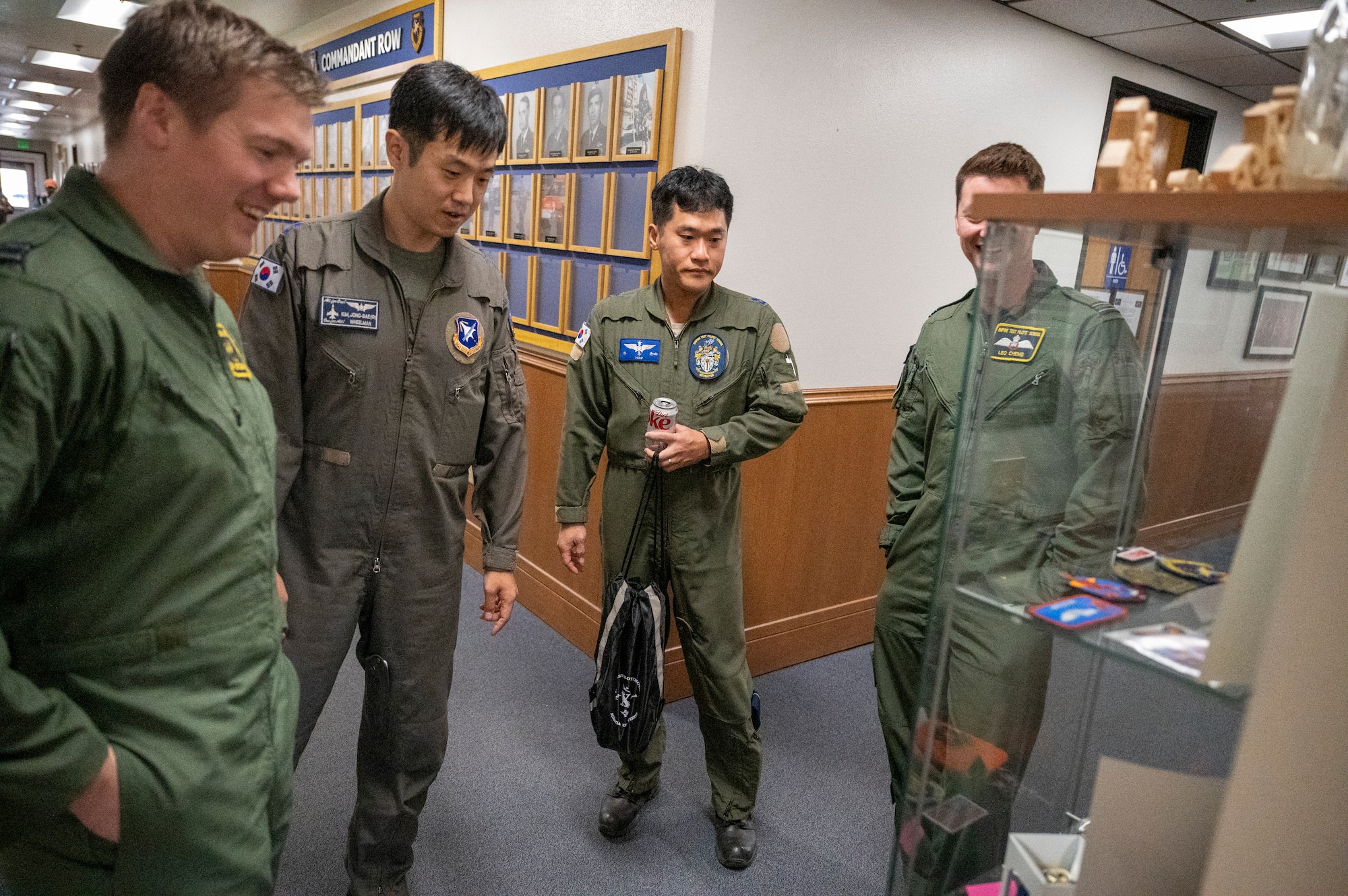 The USAF Test Pilot School (TPS) at Edwards Air Force Base hosted the Republic of Korean Air Force (ROKAF) for a technical exchange, sharing both flight experiences and cultural traditions.