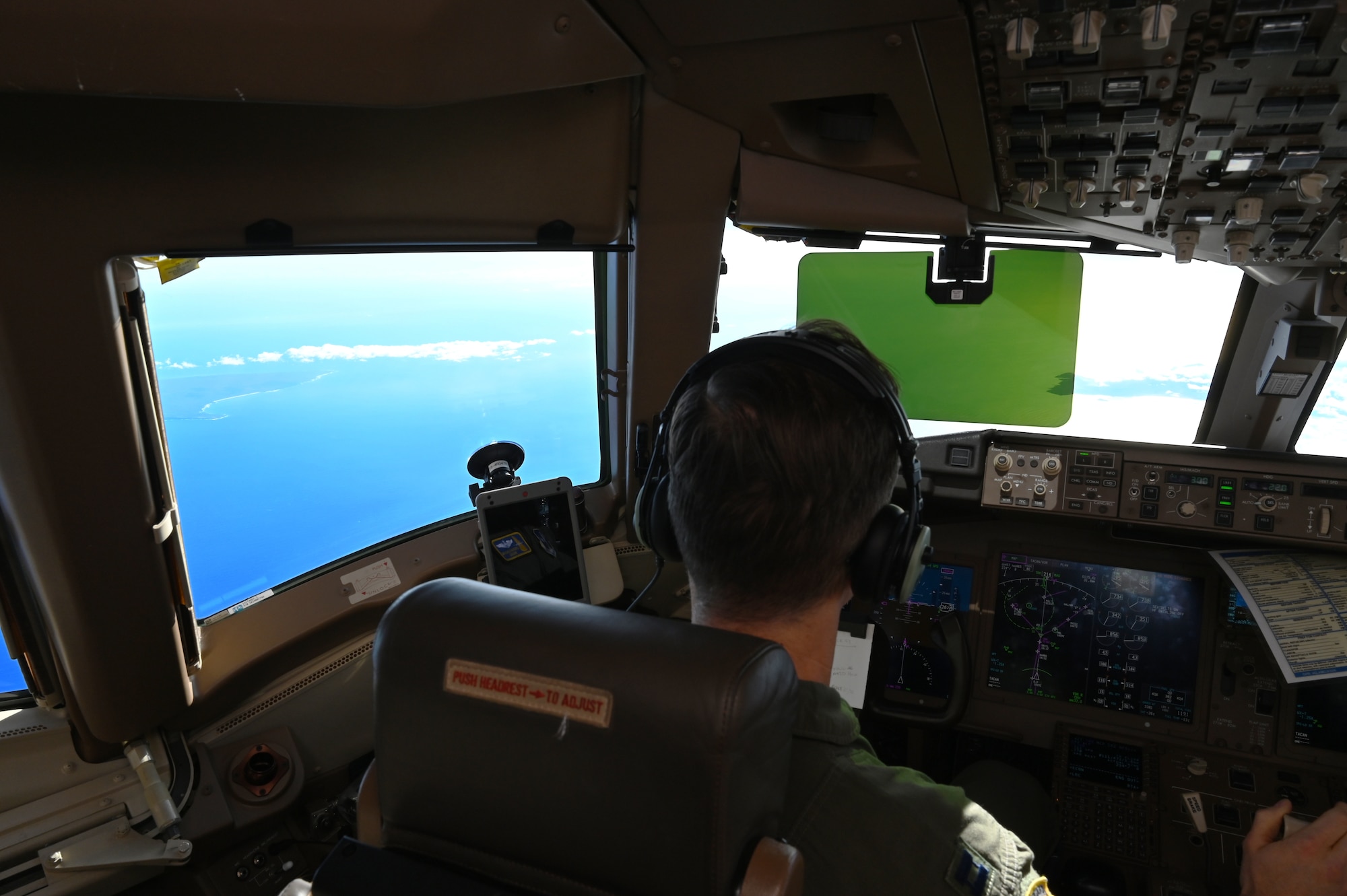 Capt. Jordan Gauvin, a pilot with the 157th Air Refueling Wing, Pease Air National Guard Base, New Hampshire Air National Guard, guides a KC-46A Pegasus over the Pacific Ocean during a 36-hour endurance mission, Nov. 16, 2022. 

The long-duration sortie took place from Nov. 16-17 and was crewed by active duty and Air National Guard Airmen from Pease, who flew the jet non-stop from New Hampshire, across North America and the Pacific Ocean, around Guam, and back home again. The proof-of-concept operation showcased the ability of the Air Force’s newest tanker to project the force in the modern battle space. (U.S. Air National Guard photo by Senior Master Sgt. Timm Huffman)