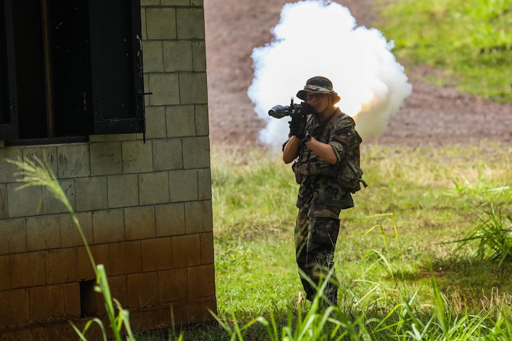 A Soldier from the 25th Infantry Division shoots off a simulated RPG during a firefight at Kahuku Training Area, Hawaii during the Joint Pacific Multi-National Readiness Center rotation 22-01 exercise on Oct. 25, 2021. JPMRC Rotation 22-01 provides the 25th Infantry Division the opportunity to integrate and train alongside our partners and allies throughout the Indo-Pacific Region. (U.S. Army photo by Sgt. Carlie Lopez/28th Public Affairs Detachment)