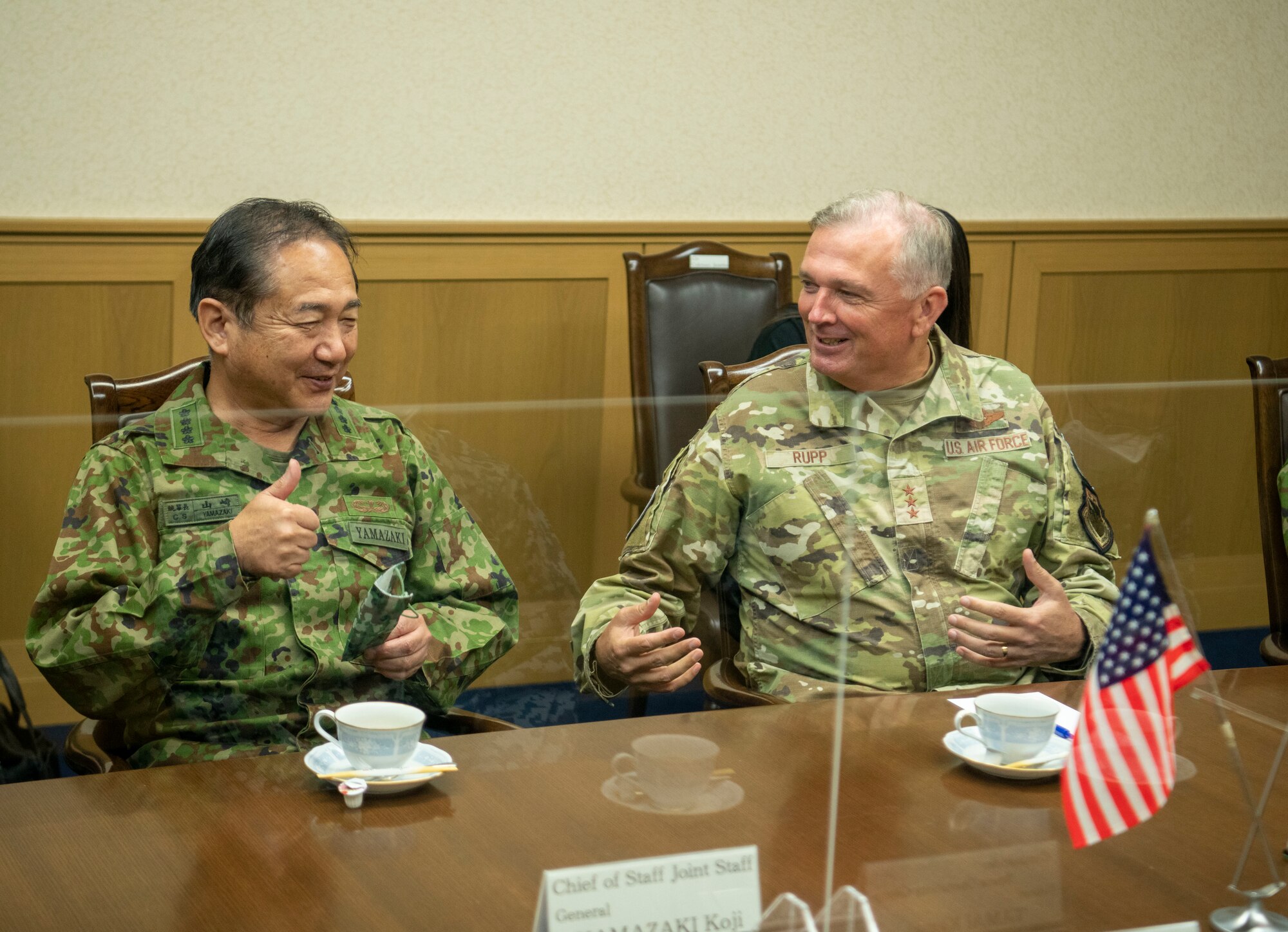 U.S. Air Force Lt. Gen. Ricky Rupp, commander of United States Forces Japan and Fifth Air Force ,right, and GEN Yamazaki Koji, chief of staff for the Japan Joint Staff, chat before a Space Operations Center briefing during Exercise Keen Sword 23 at Fuchu Air Base, Japan, Nov. 17, 2022.