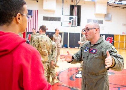 Air Force rated officer speaks to an Air Force JROTC student at Robichaud High School, Dearborn Heights, Michigan