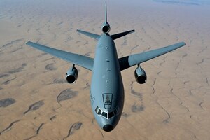 A U.S. Air Force KC-10 Extender assigned to the 908th Expeditionary Air Refueling Squadron, flies over an undisclosed location
