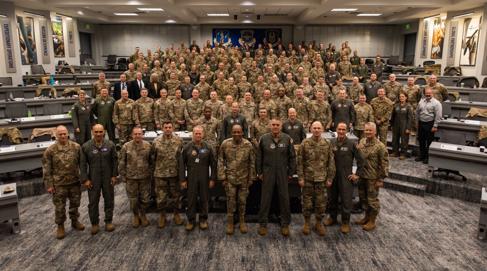 U.S. Air Force Chief of Staff Gen. CQ Brown, Jr. and Gen. Mike Minihan stand shoulder-to-shoulder with senior leaders from eight major commands at Air Mobility Command’s Fall Phoenix Rally at Scott Air Force Base, Ill. Nov. 17, 2022. The event brought together leaders from across the Mobility Air Forces and the broader Air Force to talk about what is required to ensure the Joint force is ready for a high-end fight. During the event, AMC presented leaders with its Competition Campaign Plan, which operationalizes the command’s strategy to provide a winning scheme of maneuver for the Joint Force. (U.S. Air Force photo by Tech. Sgt. Zachary Boyer)