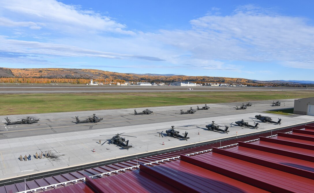 Twenty helicopters from 1st Battalion, 25th Aviation Regiment, conducted the largest movement of AH-64 helicopters in the history of state on Sunday when they flew from Fort Wainwright to the Donnelly Training Area. (Photo by Eve Baker, Fort Wainwright Public Affairs Office)