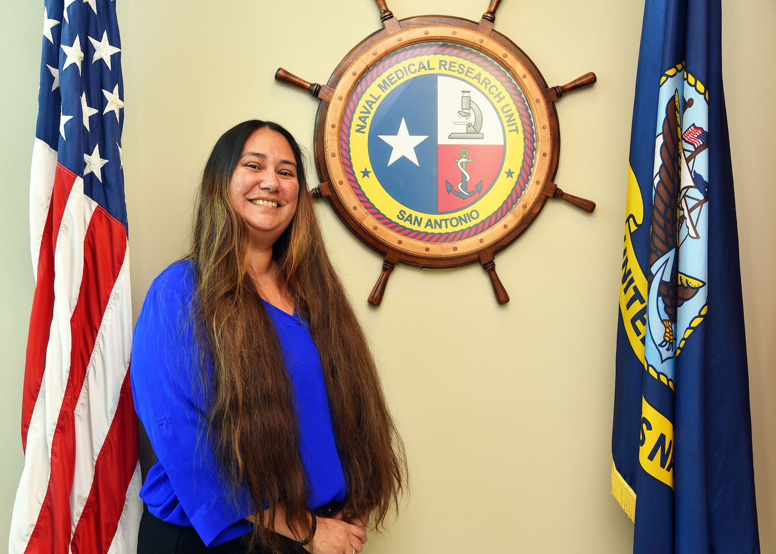 JOINT BASE SAN ANTONIO-FORT SAM HOUSTON – (Nov. 18, 2022) – Native American Heritage Month marks a time to showcase and honor the many contributions Native Americans have made to the Department of Defense (DoD) and the nation. For Naval Medical Research Unit (NAMRU) San Antonio, Sara BlackCloud, a financial management analyst, assigned to the Resource Management and Acquisitions Directorate, is a representation of the highly professional and diverse civilian workforce within the Department of the Navy.  Born in San Bernardino, Calif., and raised in San Diego, BlackCloud has been a Navy civilian for six years. She first enlisted in the U.S. Air Force in 2002 and enter service in the U.S. Army in 2008 deploying in support of Operation Enduring Freedom in Afghanistan. NAMRU San Antonio's mission is to conduct gap driven combat casualty care, craniofacial, and directed energy research to improve survival, operational readiness, and safety of DoD personnel engaged in routine and expeditionary operations. NAMRU San Antonio is one of the leading research and development laboratories for the U.S. Navy under the DoD and is one of eight subordinate research commands in the global network of laboratories operating under the Naval Medical Research Center in Silver Spring, Md. (U.S. Navy photo by Burrell Parmer, NAMRU San Antonio Public Affairs/Released)