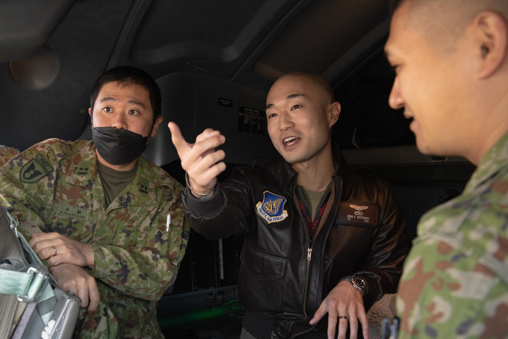 A pilot points out different C-130J capabilities to Japan Ground Self-Defense Force soldiers.