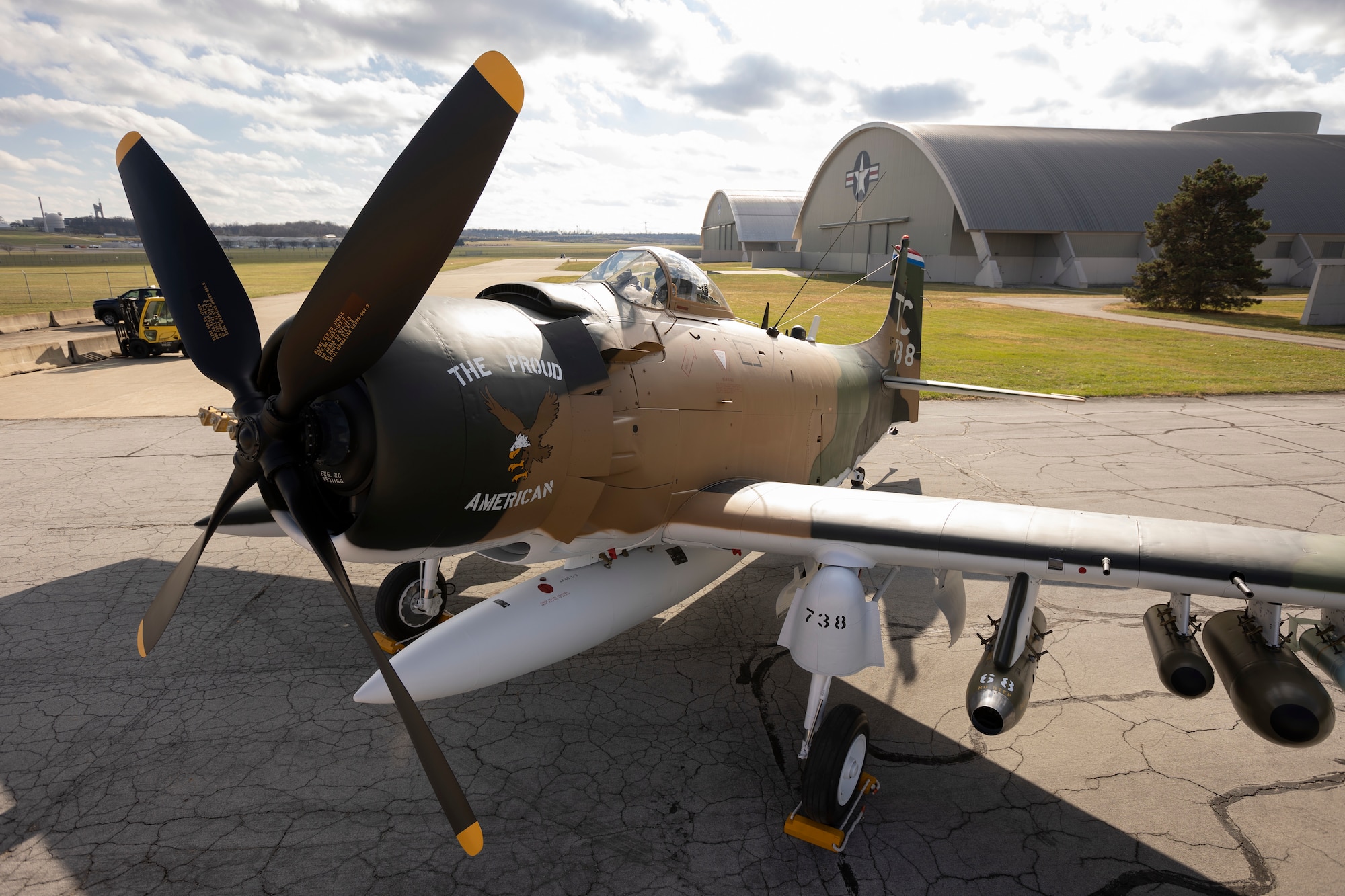 The aircraft on display represents Captain Ronald Smith’s A-1H The Proud American (Serial Number 52-139738) as it appeared during his SAR mission in June 1972 as part of the 1st Special Operations Squadron, Nakhon Phanom (NKP) Royal Thai Air Force Base, Thailand.