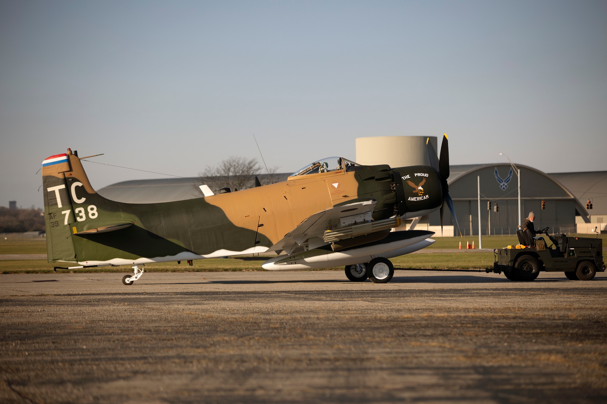 The aircraft on display represents Captain Ronald Smith’s A-1H The Proud American (Serial Number 52-139738) as it appeared during his SAR mission in June 1972 as part of the 1st Special Operations Squadron, Nakhon Phanom (NKP) Royal Thai Air Force Base, Thailand.