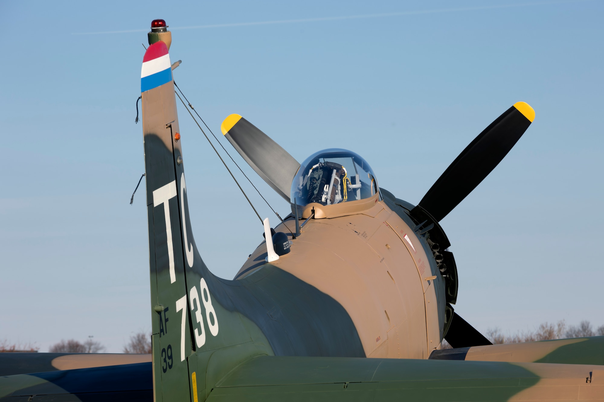 The aircraft on display represents Captain Ronald Smith’s A-1H The Proud American (Serial Number 52-139738) as it appeared during his SAR mission in June 1972 as part of the 1st Special Operations Squadron, Nakhon Phanom (NKP) Royal Thai Air Force Base, Thailand.