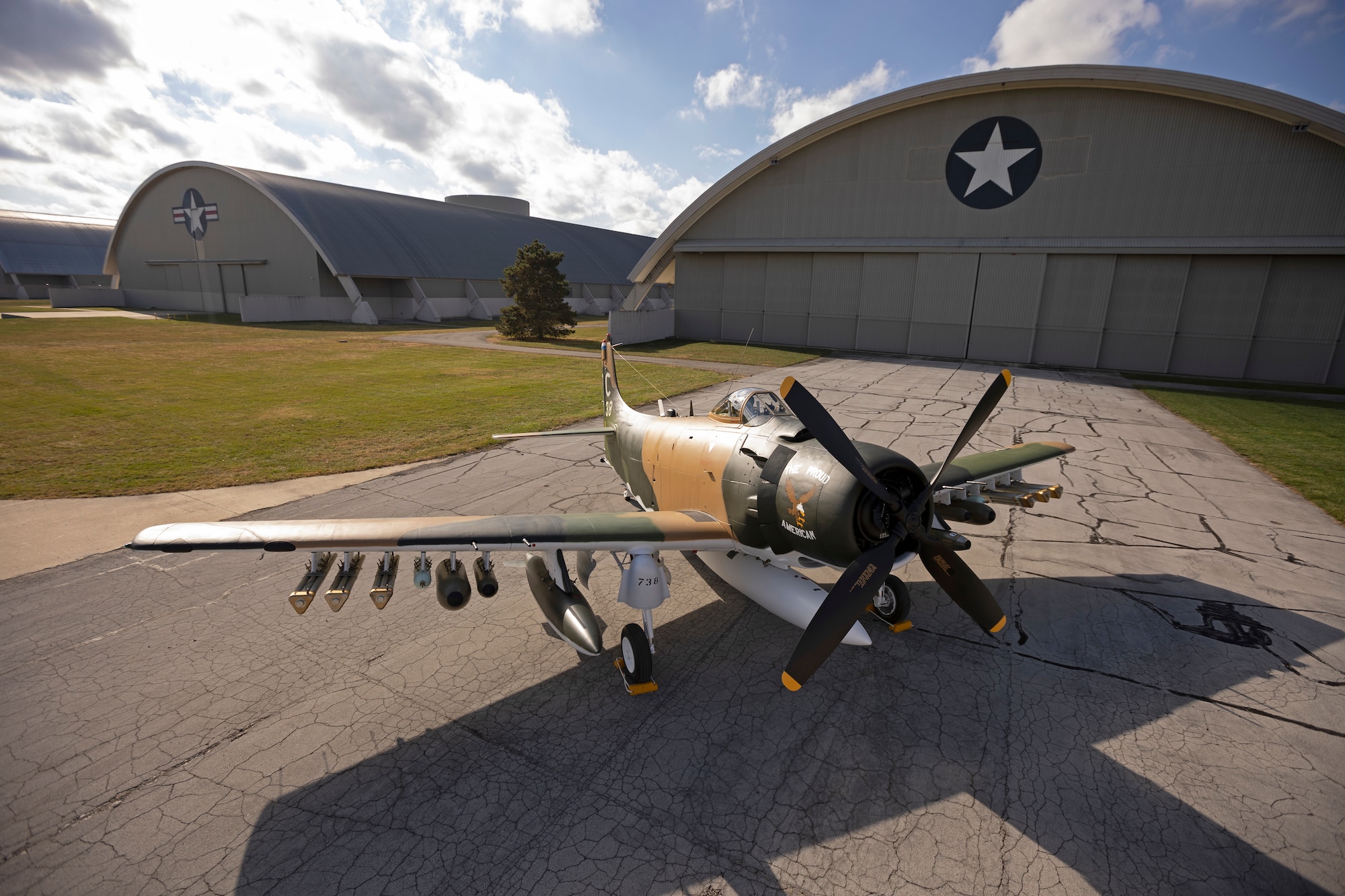 The aircraft on display represents Captain Ronald Smith’s A-1H The Proud American (Serial Number 52-139738) as it appeared during his SAR mission in June 1972 as part of the 1st Special Operations Squadron, Nakhon Phanom (NKP) Royal Thai Air Force Base, Thailand.