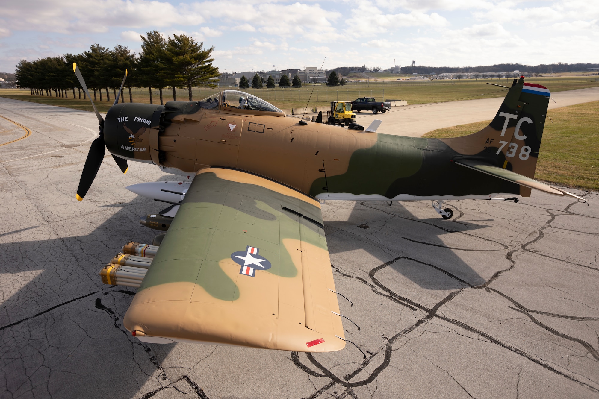 The aircraft on display represents Captain Ronald Smith’s A-1H The Proud American (Serial Number 52-139738) as it appeared during his SAR mission in June 1972 as part of the 1st Special Operations Squadron, Nakhon Phanom (NKP) Royal Thai Air Force Base, Thailand.