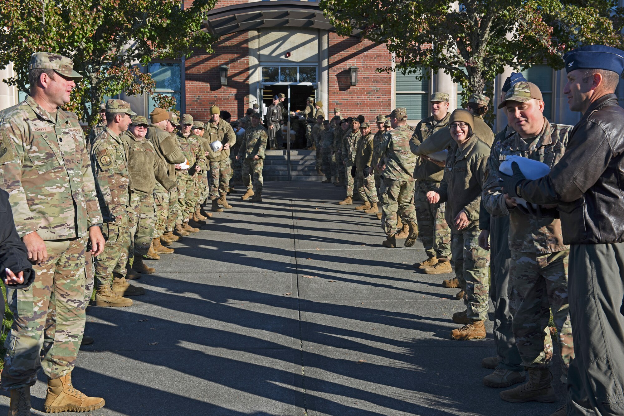 Team McChord Airmen line up to participate in Operation Turkey Drop at Joint Base Lewis-McChord, Washington, Nov. 18, 2022. Hundreds of turkeys, gift cards and additional food items were donated by the Air Force Association Washington State Chapter, Pierce Military and Business Alliance, the Army and Air Force Exchange Service and the Religious Support Office to provide to Airmen in time for Thanksgiving. (U.S. Air Force photo by Staff Sgt. Zoe Thacker)