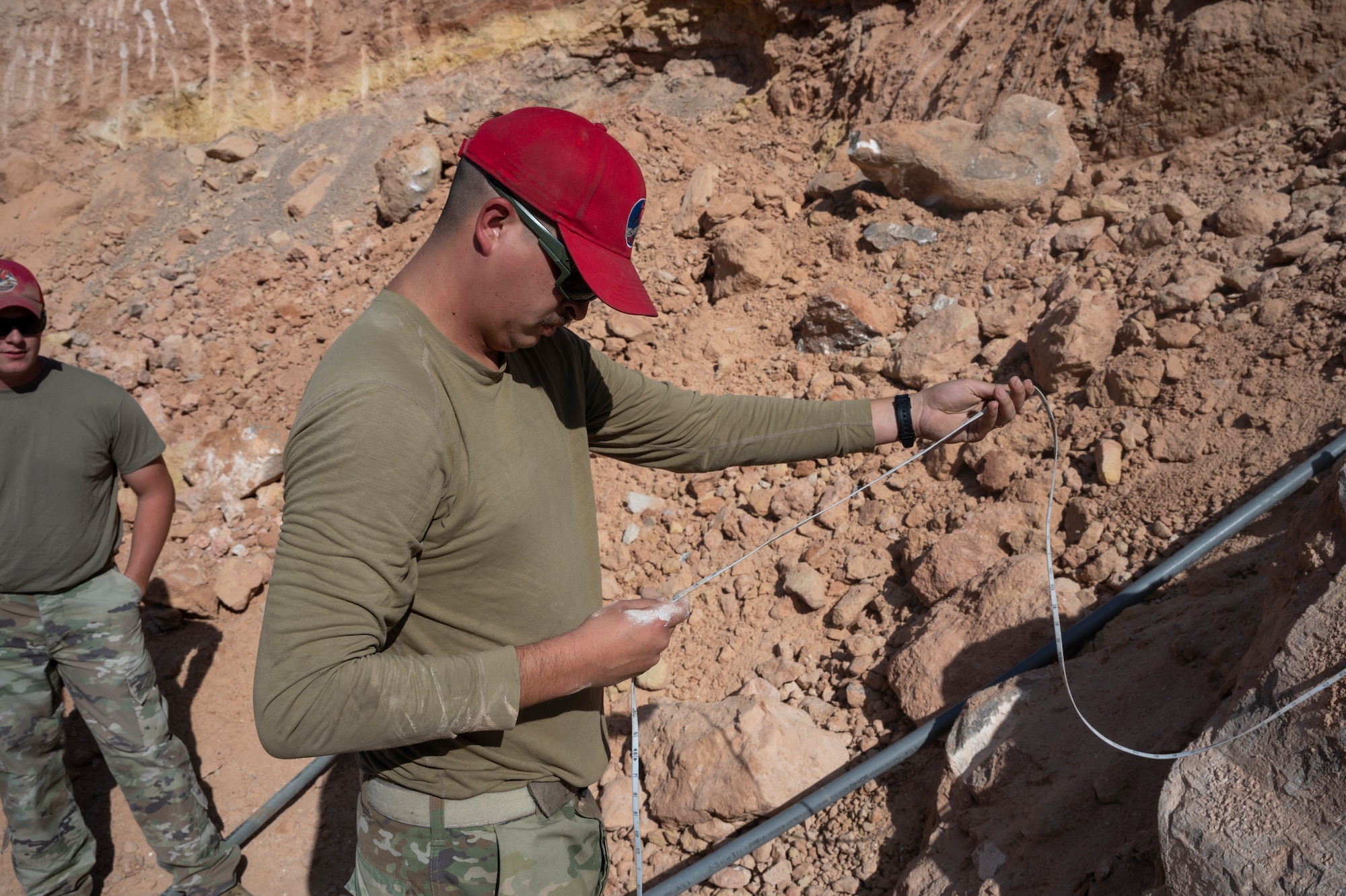 Man measures a borehole