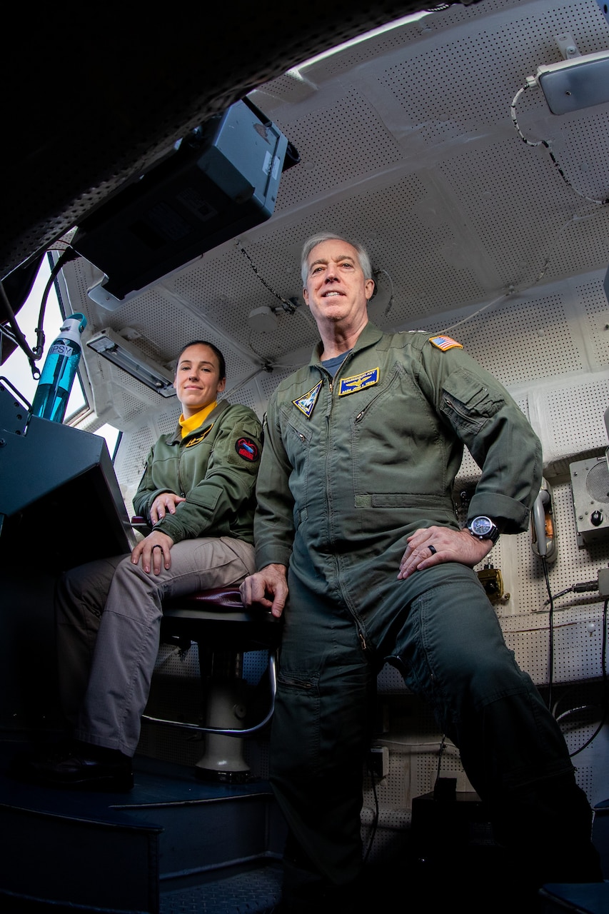 Picture of Rear Adm. Meier with a Lt. Cmdr. pose for a photo